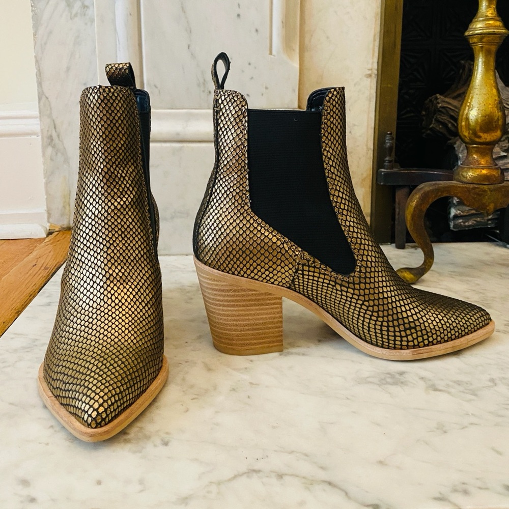 Gold, faux snakeskin boots by Dolce Vita.